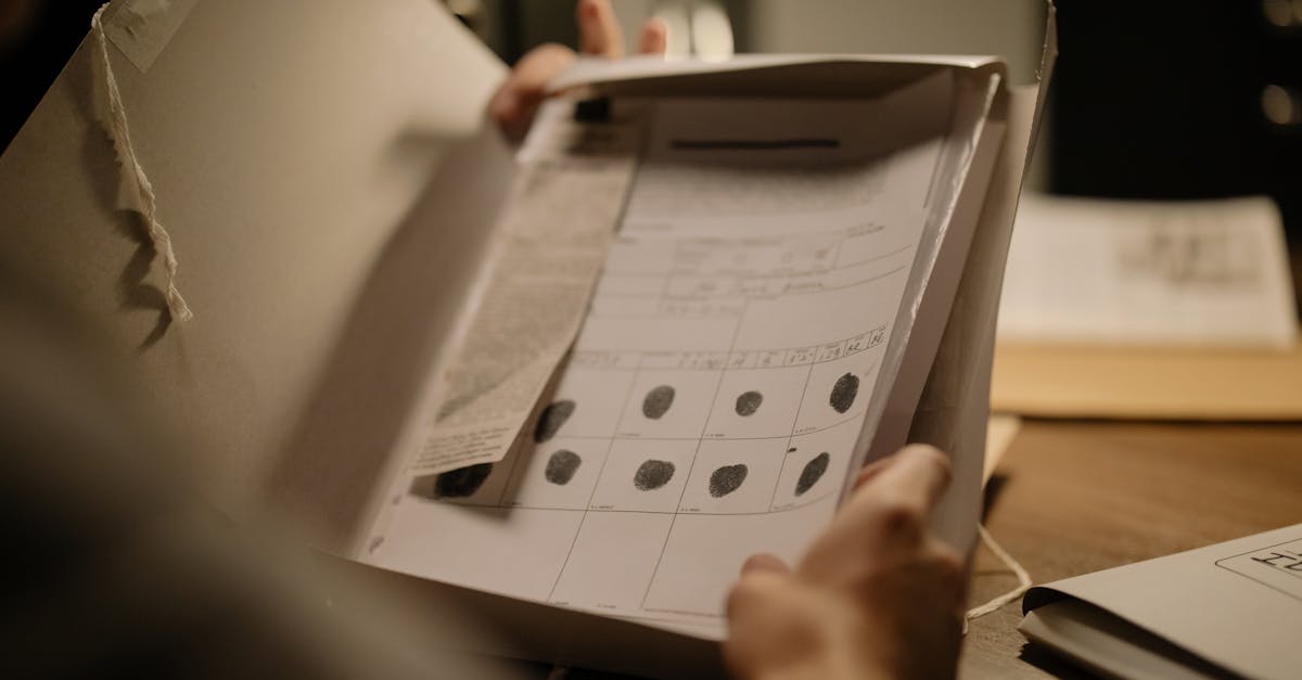 Financial documents and stock charts being examined with a magnifying glass and calculator, representing the analysis of broker investment recommendations